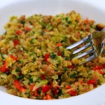 riced broccoflower with spicy Italian sausage